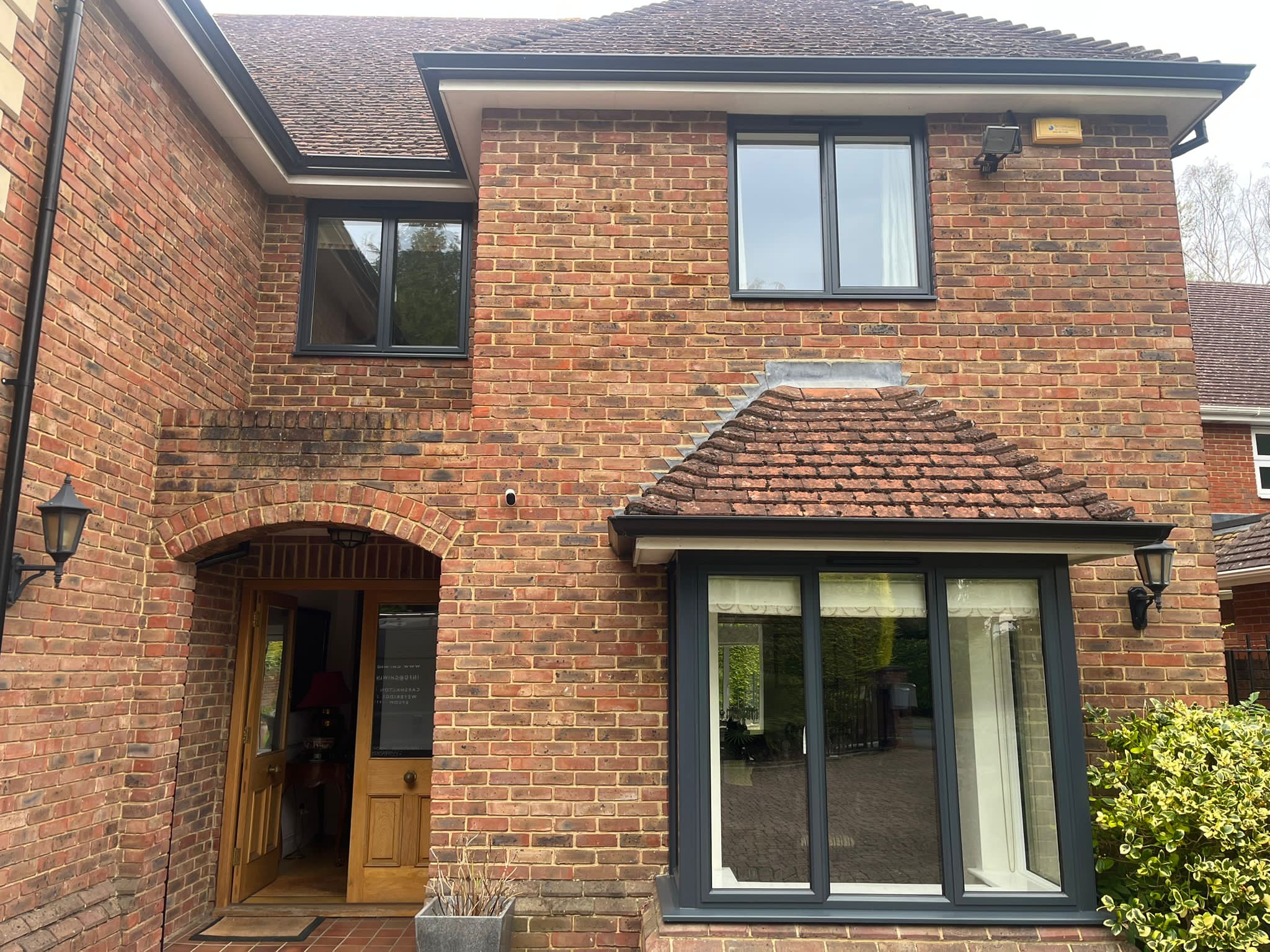 Front view of home with ALUK windows fitted on lower and upper floors